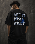 Black Cockroach Society's Least Wanted Premium Oversized T-Shirt in urban streetwear lifestyle setting with blue cockroach artwork