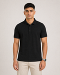 Black Drip Earth premium cotton polo - front model studio view with premium fit