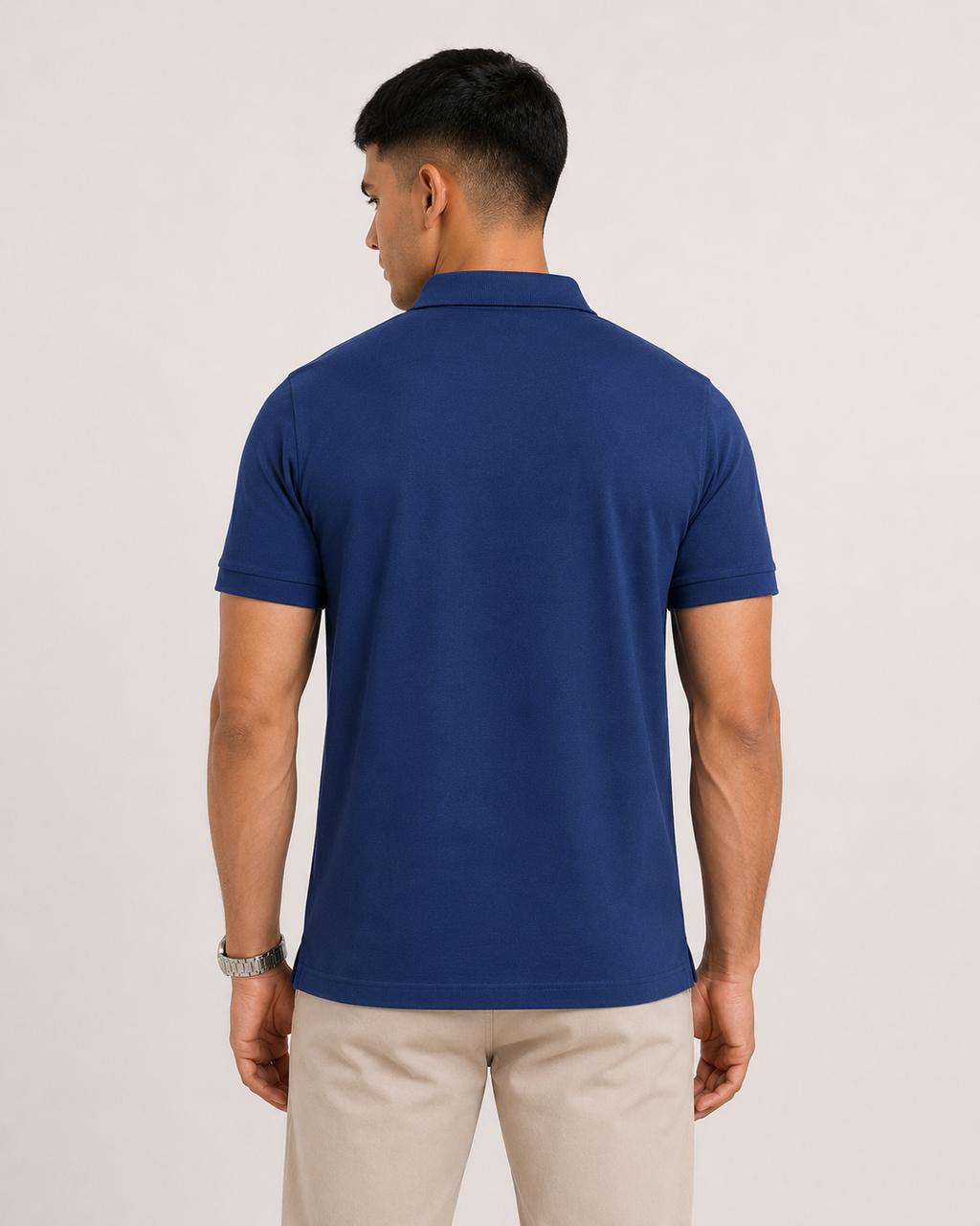 Royal-Blue Drip Earth premium cotton polo - rear model studio view with clean silhouette