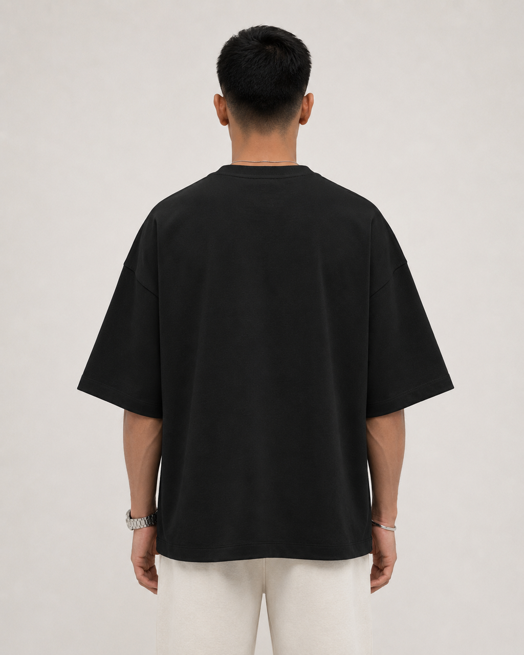 Black Drip Earth oversized terry t-shirt - rear model studio view with clean silhouette