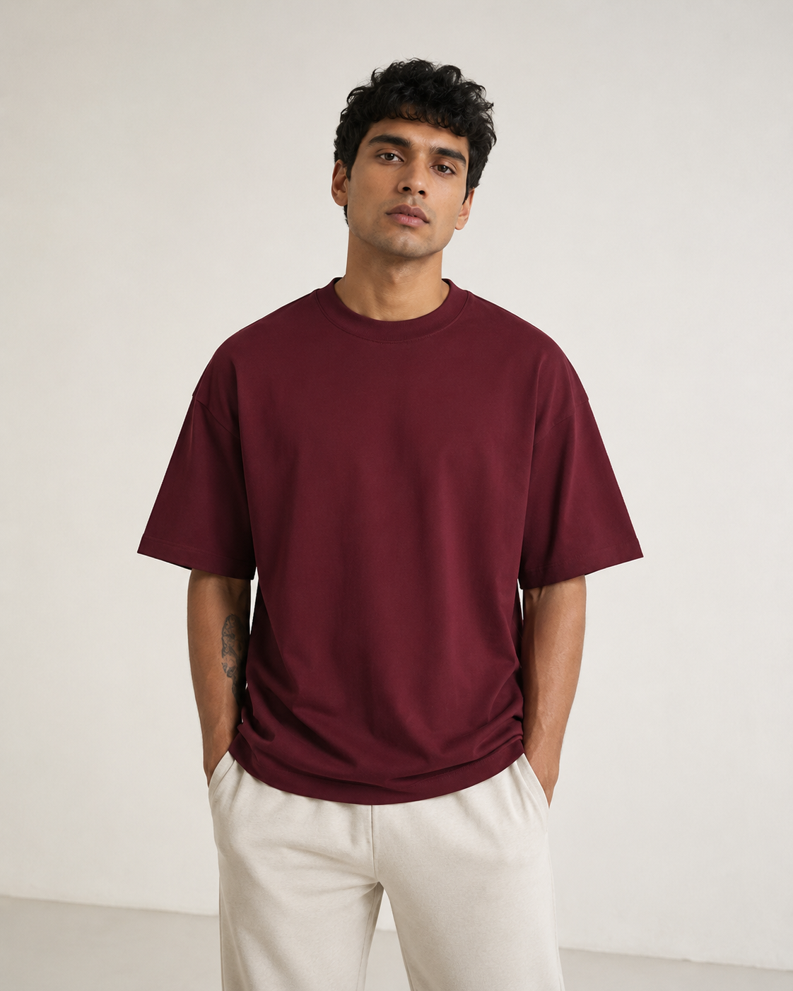 Maroon Drip Earth oversized terry t-shirt - rear model studio view with clean silhouette