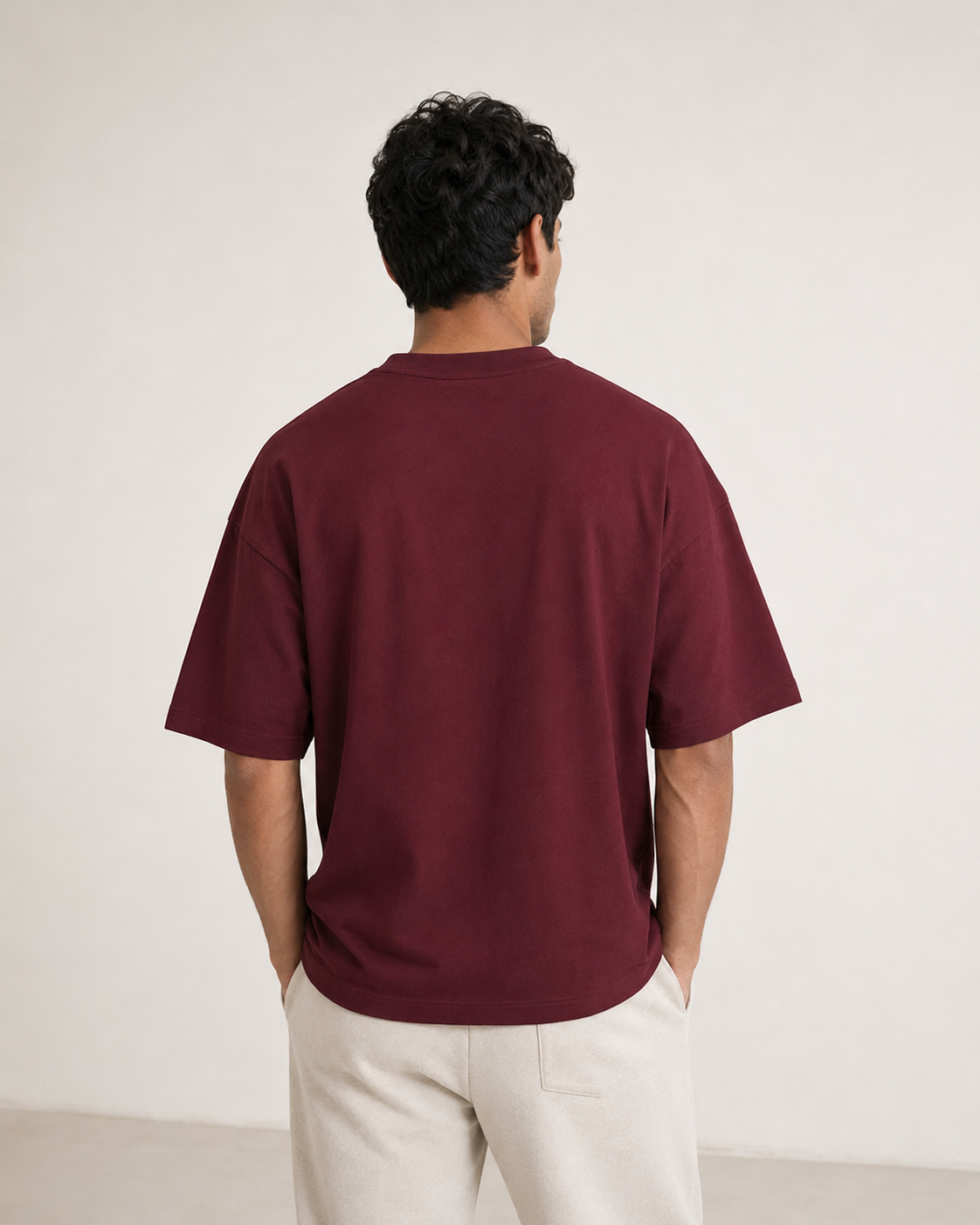 Maroon Drip Earth oversized terry t-shirt - front model studio view with premium fit