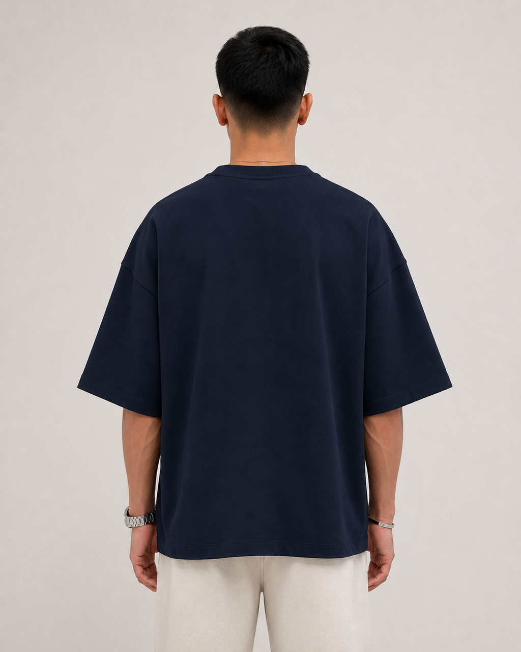 Navy-Blue Drip Earth oversized terry t-shirt - rear model studio view with clean silhouette