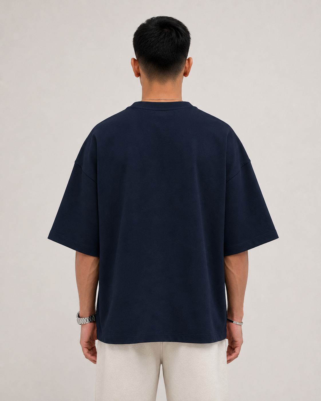 Navy-Blue Drip Earth oversized terry t-shirt - rear model studio view with clean silhouette