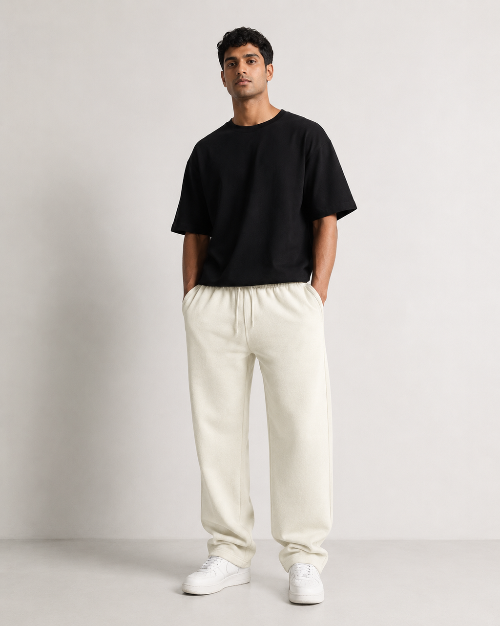 Off-White Drip Earth relaxed sweatpants - front model studio view with premium fit