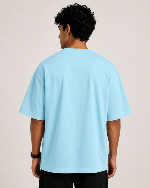 Baby-Blue Drip Earth oversized t-shirt - rear model studio view with clean silhouette