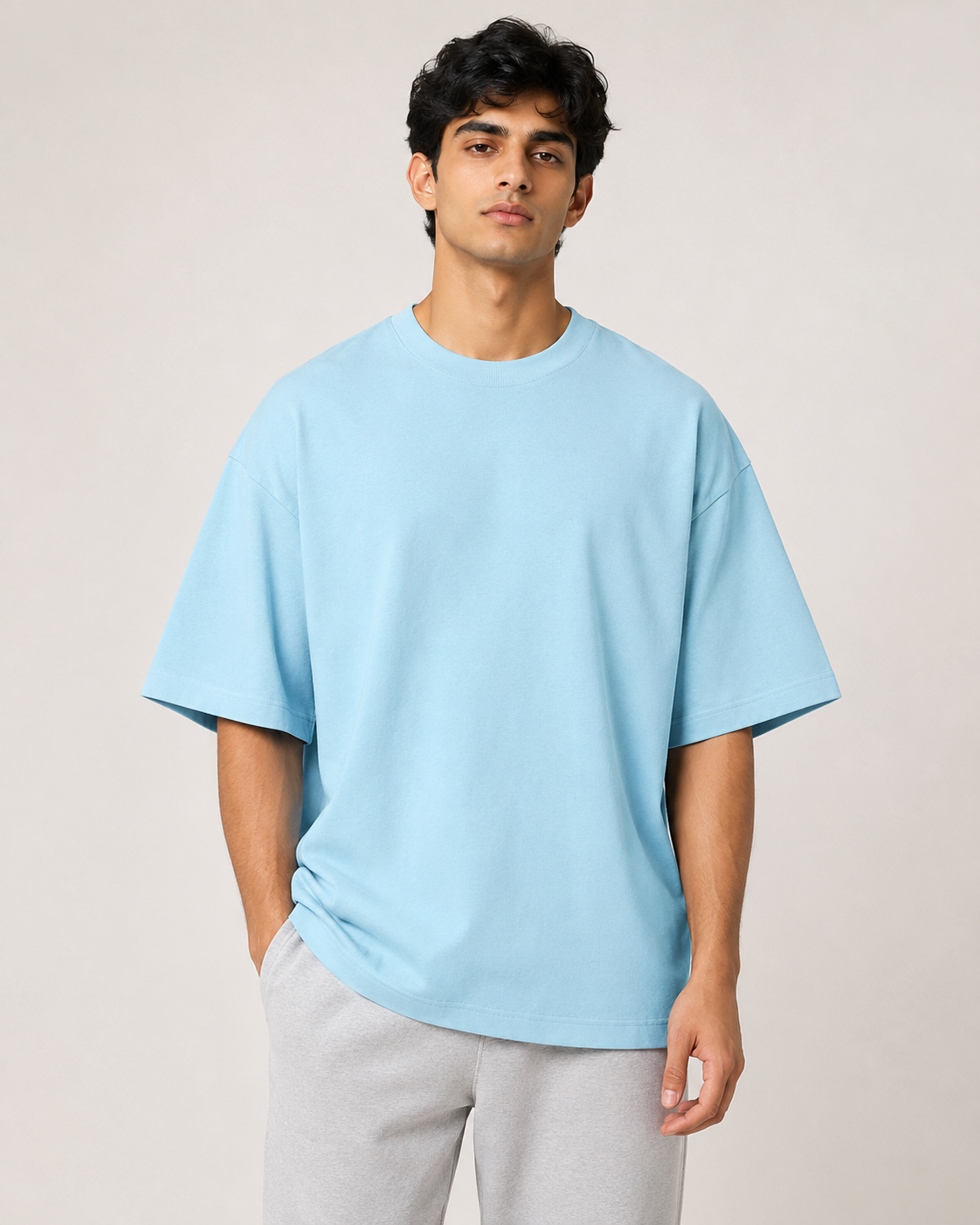 Baby-Blue Drip Earth oversized t-shirt - front model studio view with premium fit