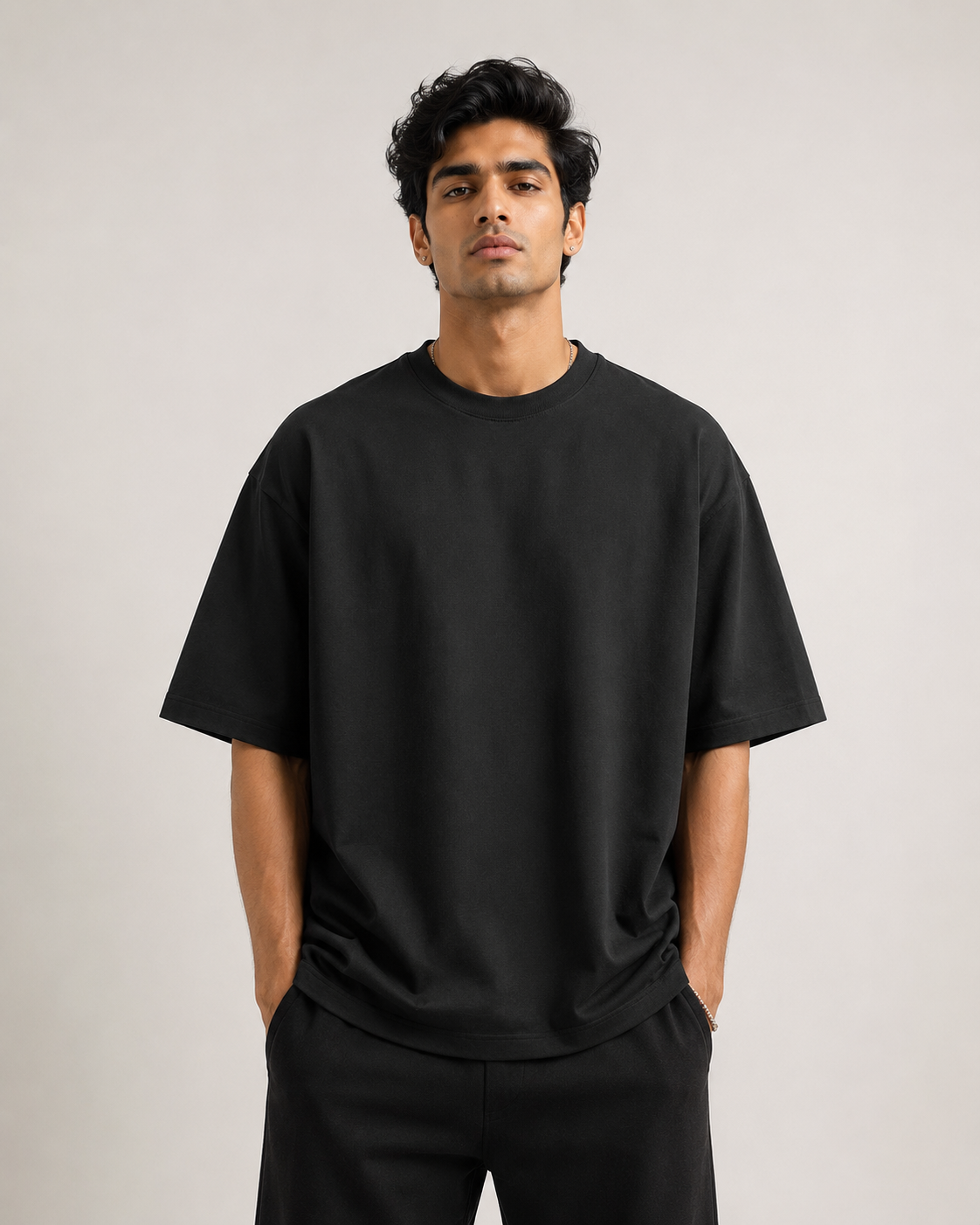 Black Drip Earth oversized t-shirt - front model studio view with premium fit
