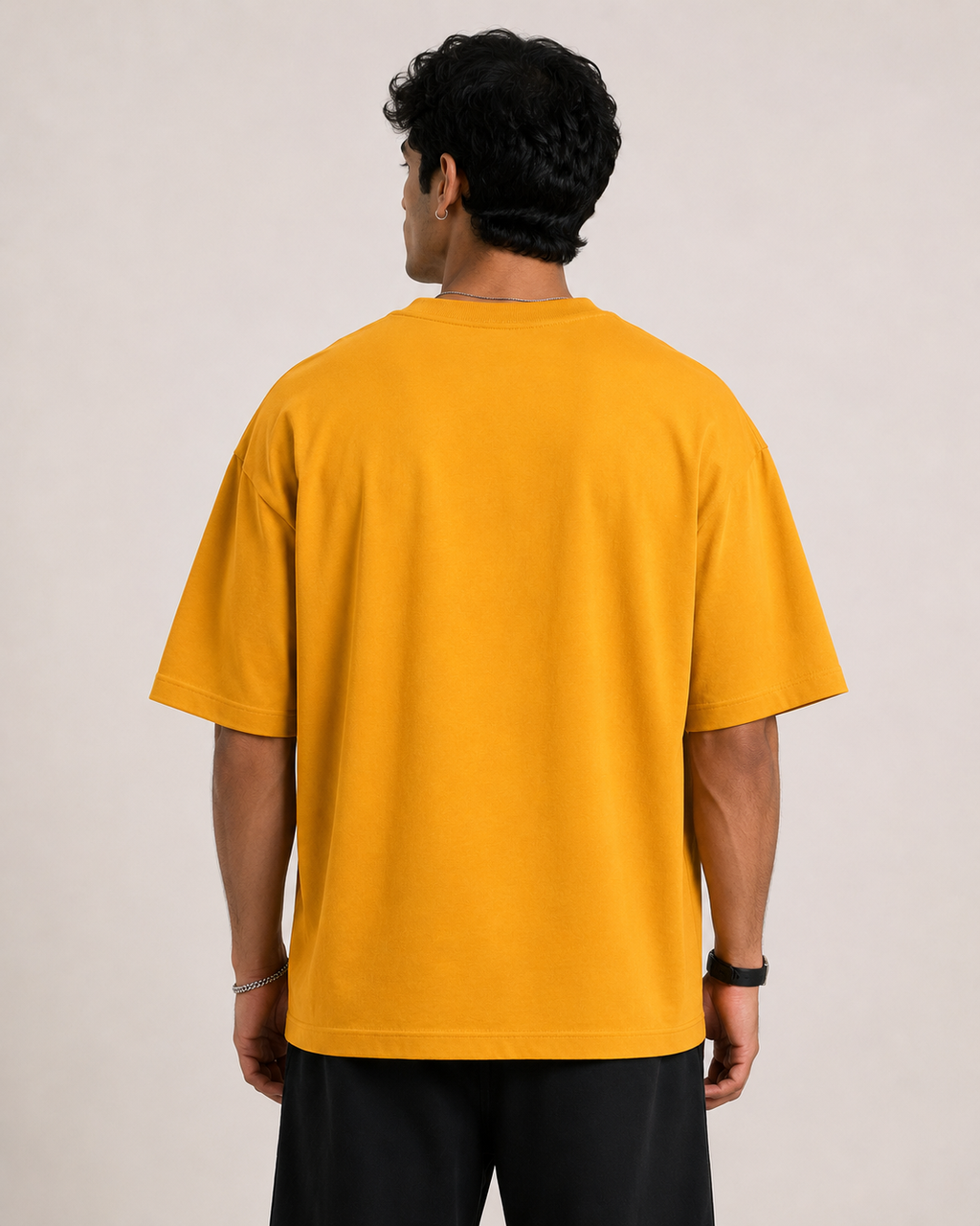 Golden-Yellow Drip Earth oversized t-shirt - rear model studio view with clean silhouette