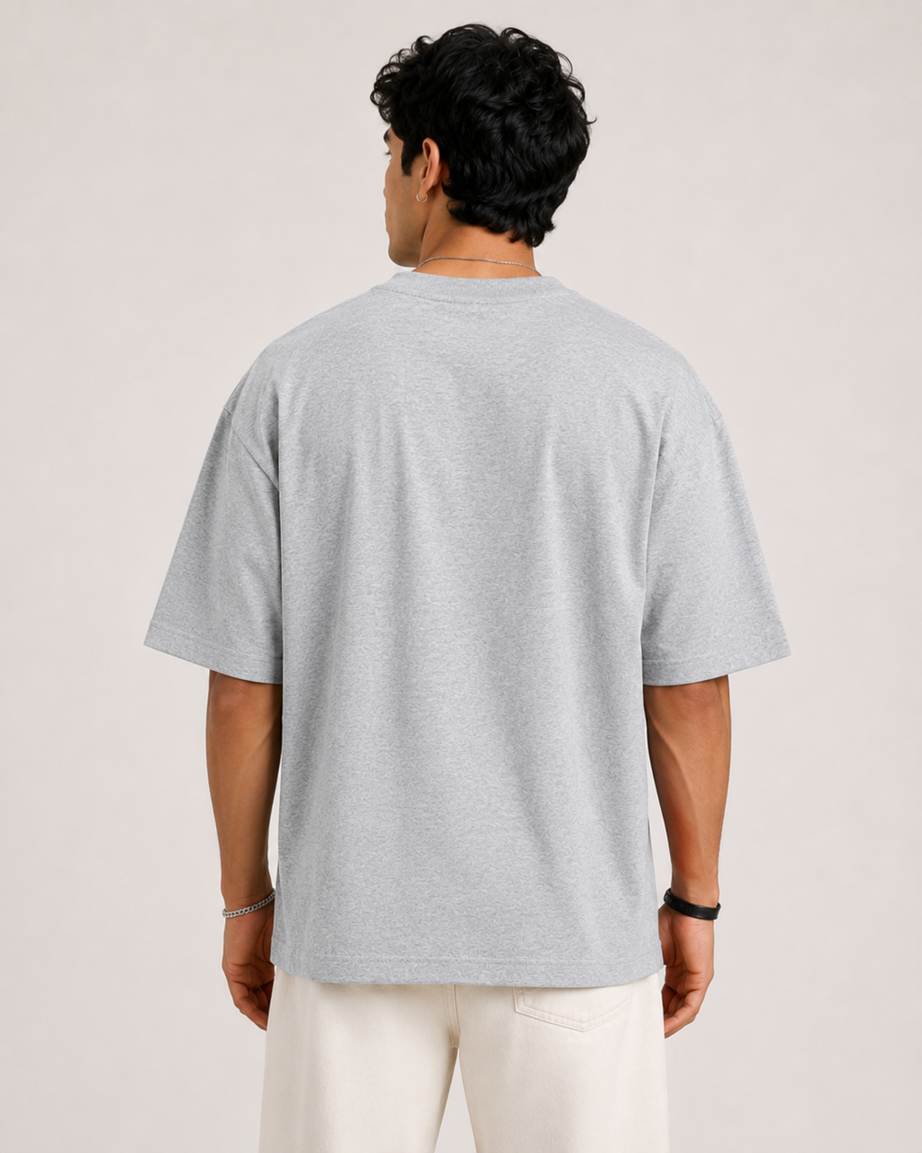 Grey-Melange Drip Earth oversized t-shirt - rear model studio view with clean silhouette