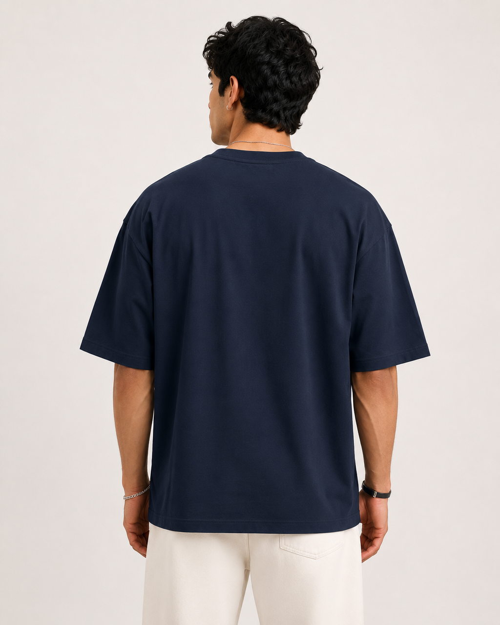 Navy-Blue Drip Earth oversized t-shirt - rear model studio view with clean silhouette