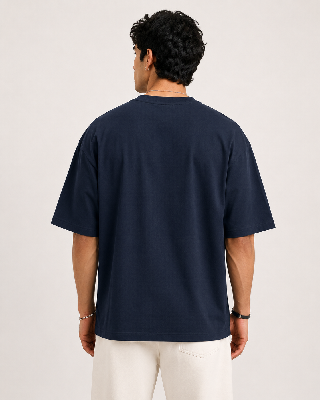 Navy-Blue Drip Earth oversized t-shirt - rear model studio view with clean silhouette