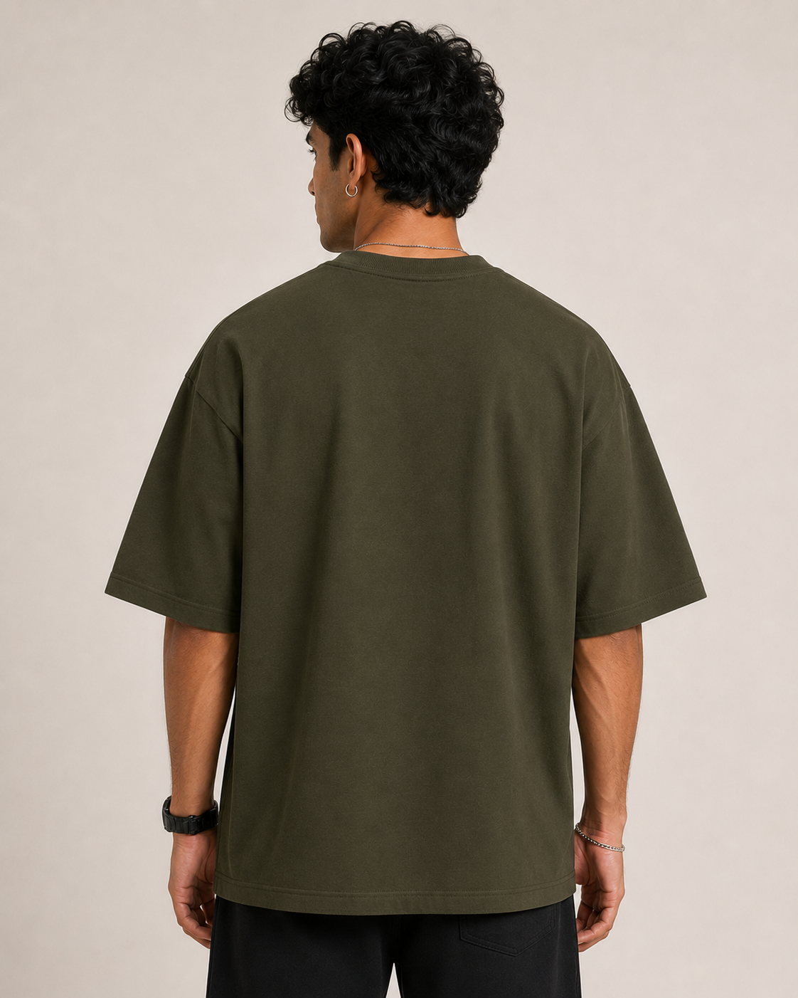Olive-Green Drip Earth oversized t-shirt - rear model studio view with clean silhouette