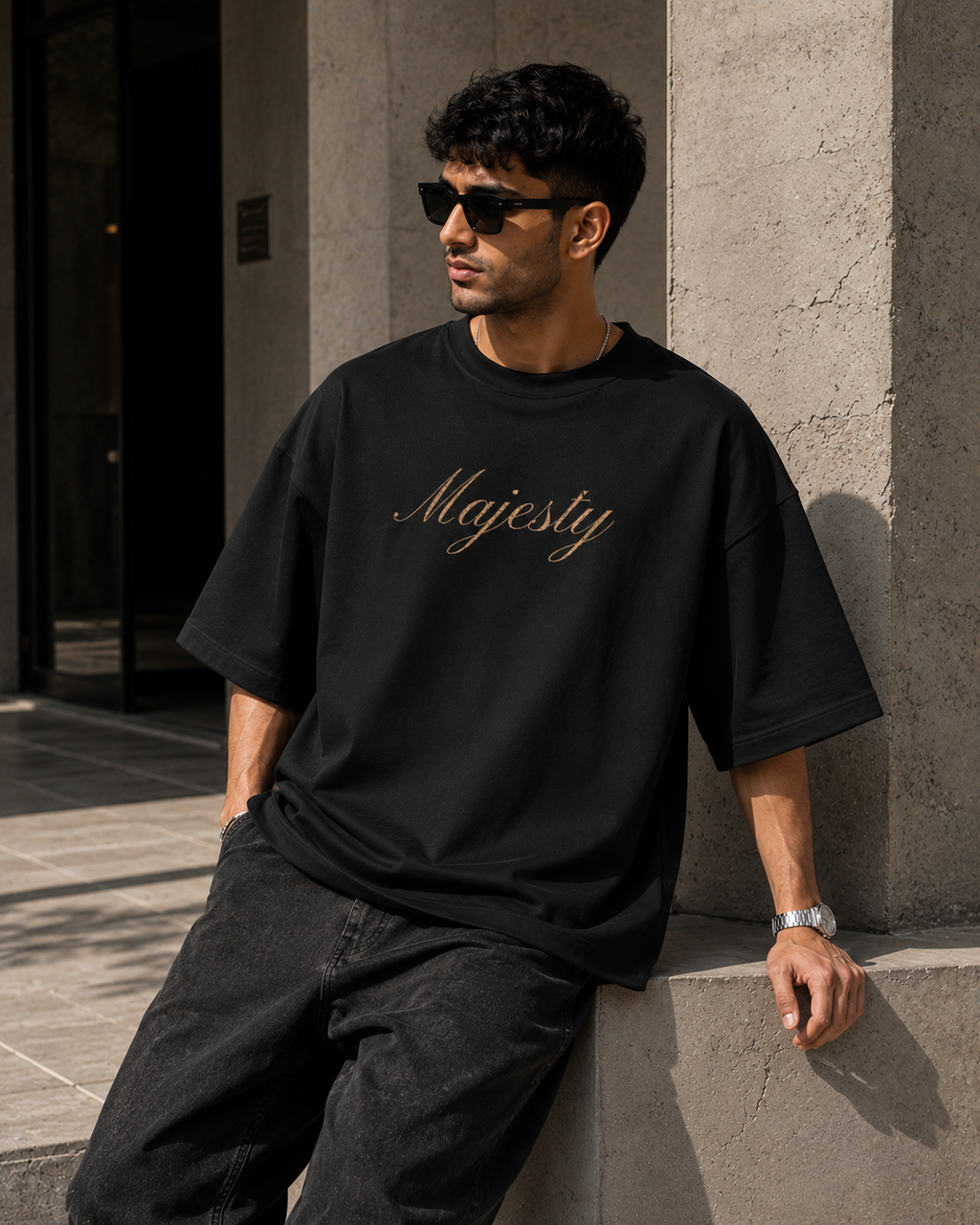 Black House of Majesty Oversized T-Shirt in premium streetwear lifestyle setting with Renaissance-inspired Majesty artwork