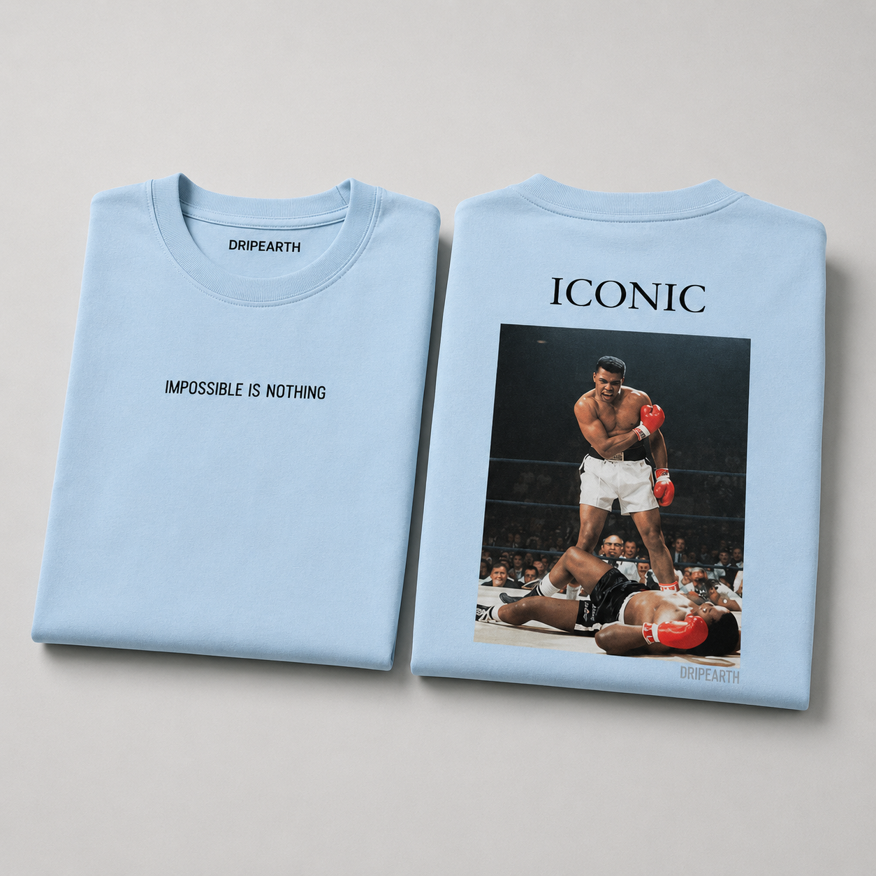 Baby-Blue Drip Earth oversized heavyweight t-shirt with ICONIC Muhammad Ali graphic - folded front and back view