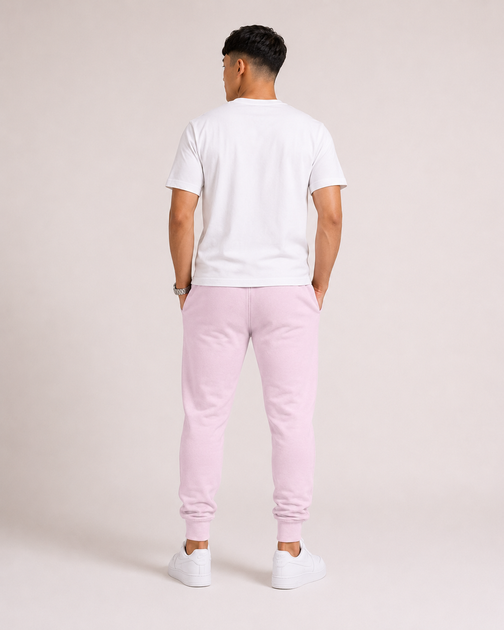 Light-Baby-Pink Drip Earth tapered joggers - rear model studio view with clean silhouette