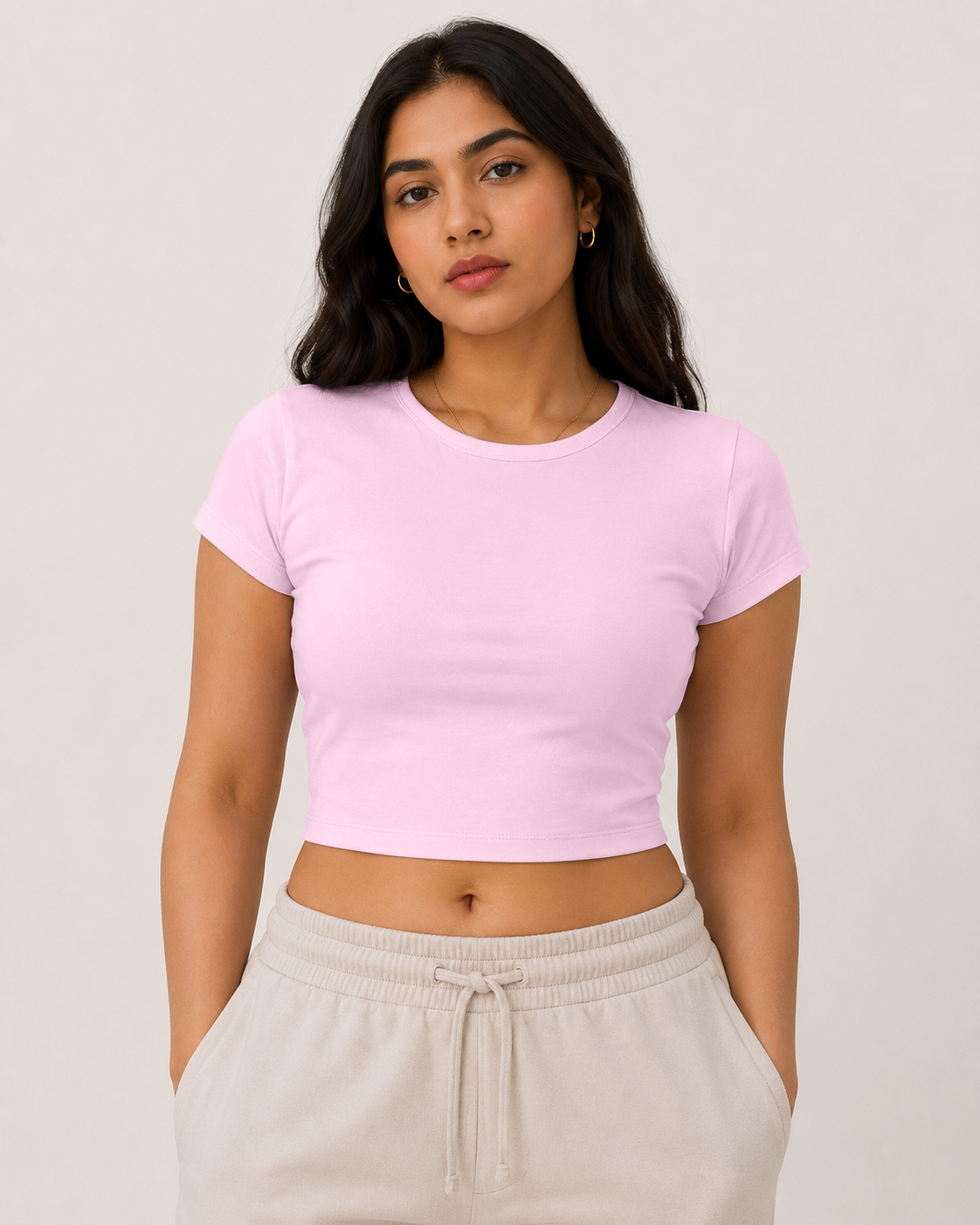 Light-Baby-Pink Drip Earth baby tee - front model studio view with premium fit