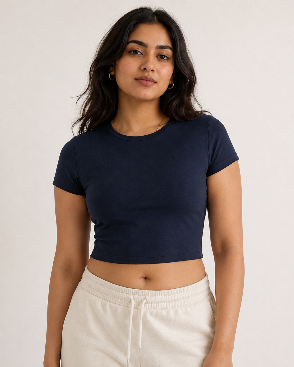 Navy-Blue Drip Earth baby tee - front model studio view with premium fit