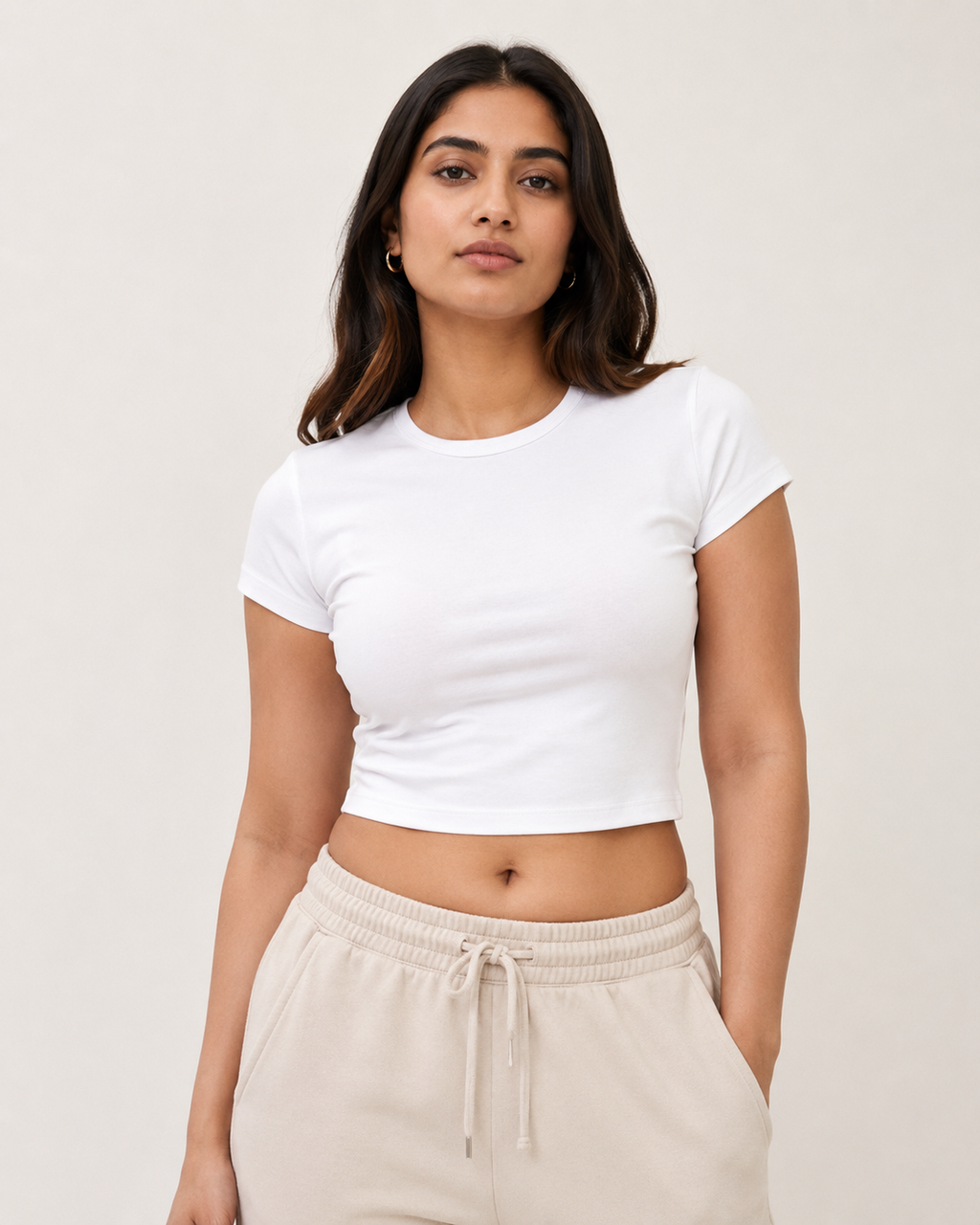 White Drip Earth baby tee - front model studio view with premium fit