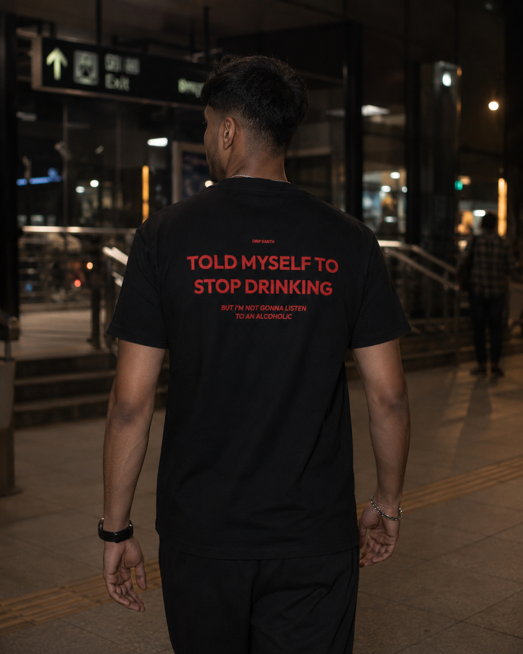 Black Drip Earth premium cotton stretch t-shirt with STOP DRINKING back graphic - rear model view