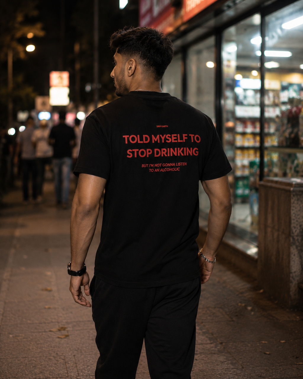 Black Drip Earth premium cotton stretch t-shirt with STOP DRINKING graphic - lifestyle streetwear shot