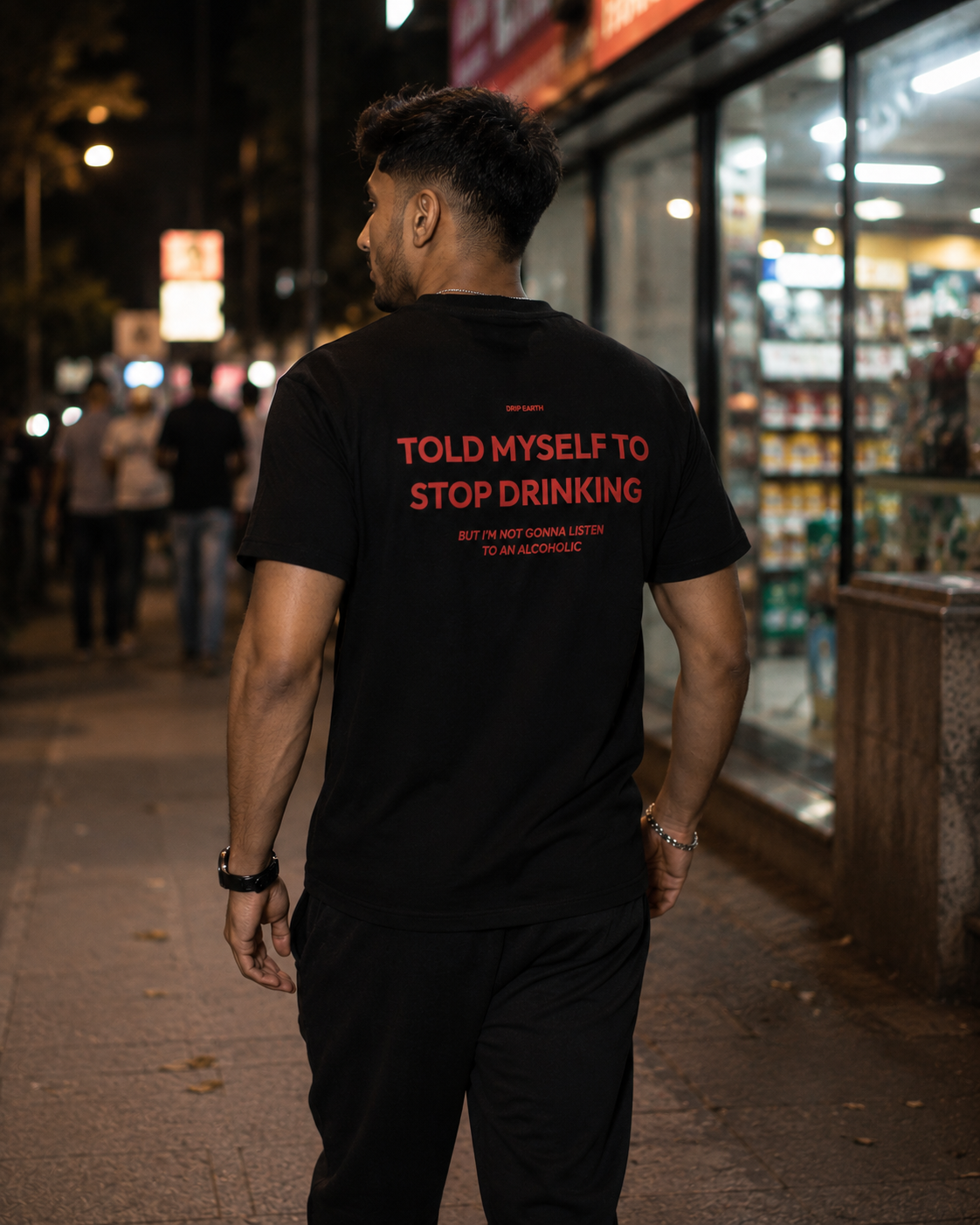 Black Drip Earth premium cotton stretch t-shirt with STOP DRINKING graphic - lifestyle streetwear shot