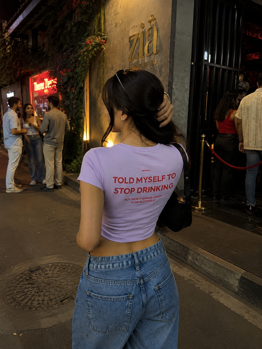 Lavender Drip Earth oversized heavyweight t-shirt with STOP DRINKING graphic - lifestyle streetwear shot