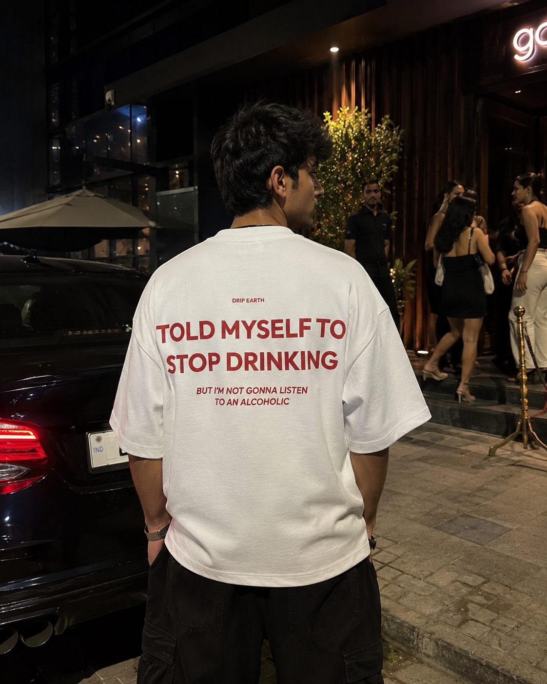 White Drip Earth oversized heavyweight t-shirt with STOP DRINKING back graphic - rear model view