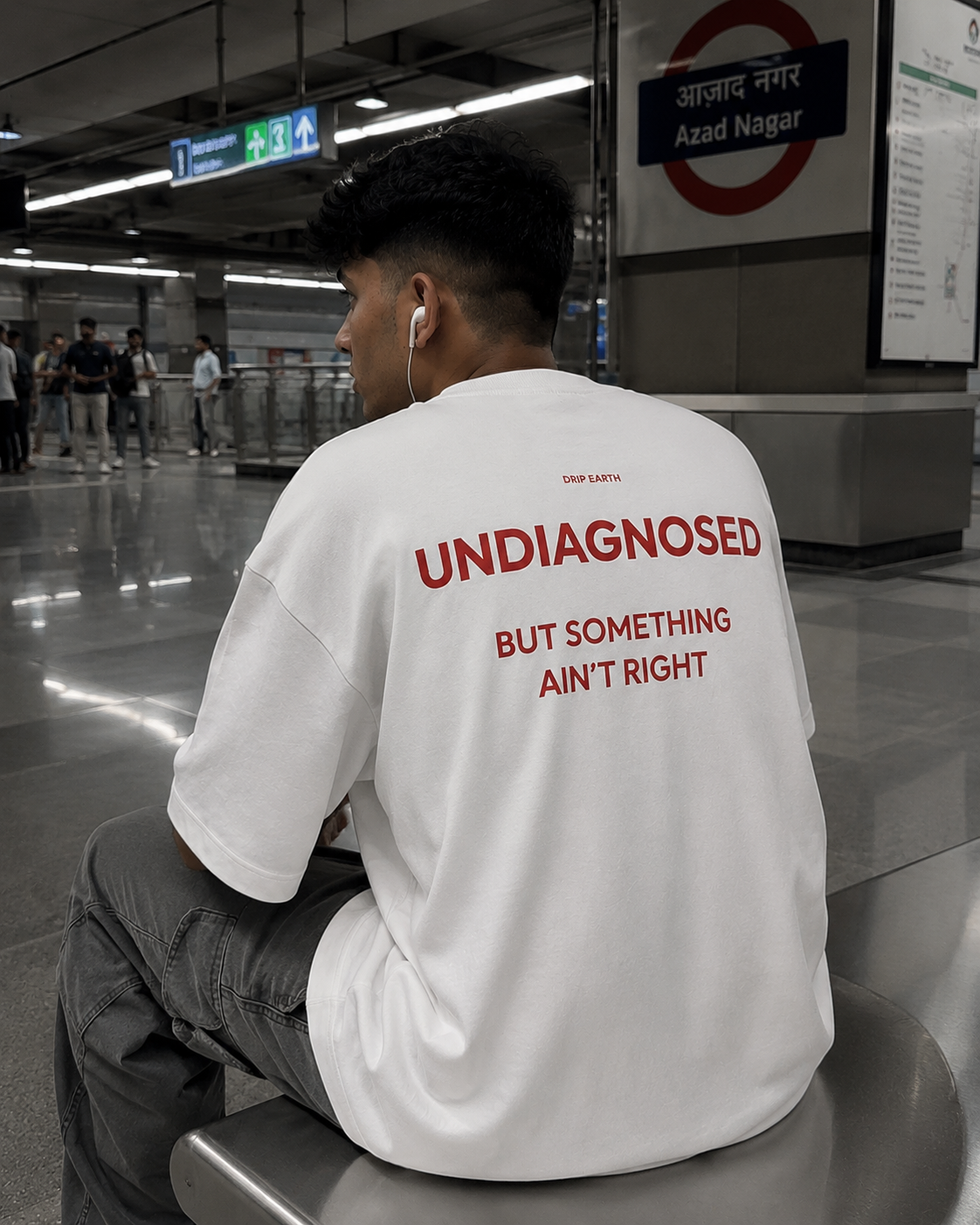 White Drip Earth oversized heavyweight t-shirt with UNDIAGNOSED graphic - lifestyle streetwear shot