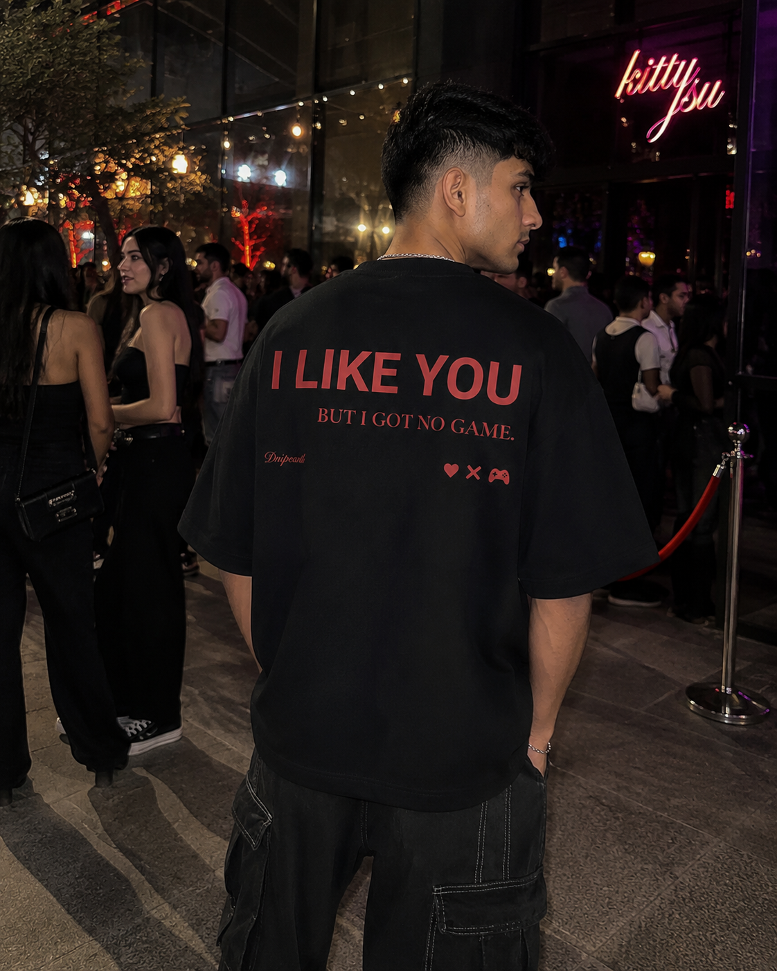 Black Drip Earth oversized heavyweight t-shirt with UNFILTERED NO GAME graphic - lifestyle streetwear shot