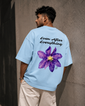 Baby-Blue Still Blooming Premium Oversized T-Shirt back view with Ever After Everything floral artwork