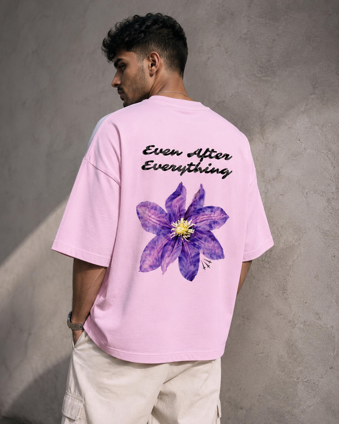 Light-Baby-Pink Still Blooming Premium Oversized T-Shirt back view with Ever After Everything floral artwork