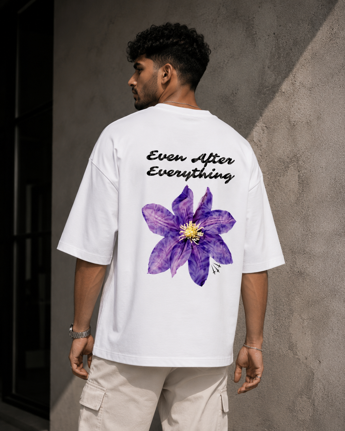 White Still Blooming Premium Oversized T-Shirt back view with Ever After Everything floral artwork